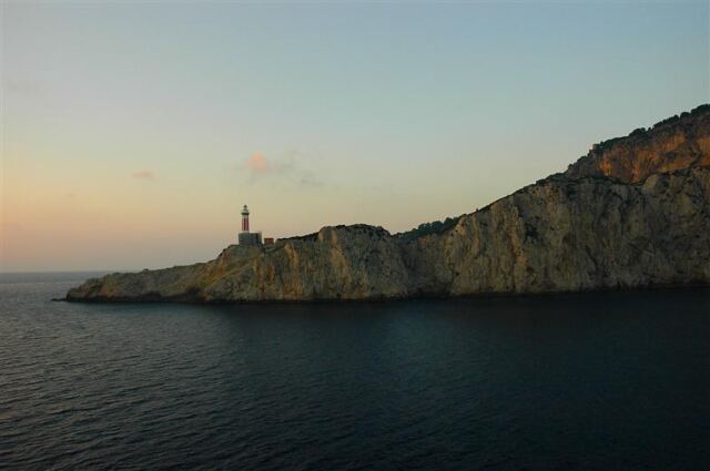 Capri lighthouse against sunset sky