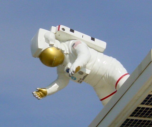 KSC VC - EVA astronaut above entrance