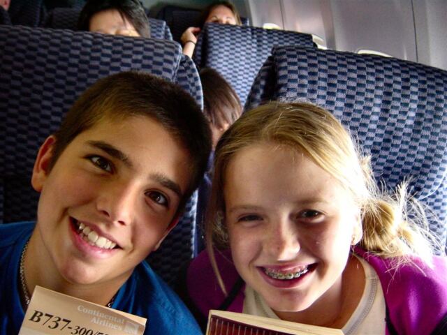 Andrew and Melanie - acting goofy on the plane