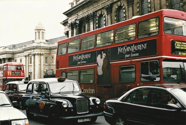 Iconic London traffic - black taxis and double-decker buses