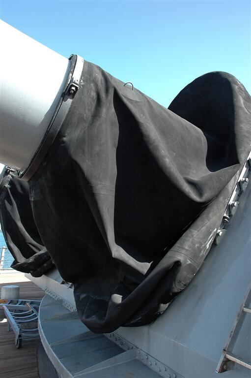Covers at base of main guns