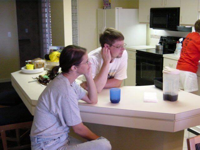 Patty and Steve listen intently... to something