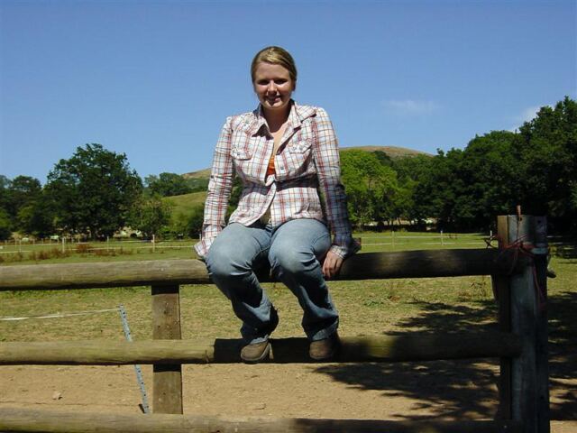 Melanie - sitting on the fence after the day's riding