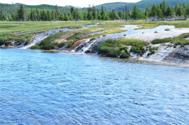 Thermal streams into river at trailhead