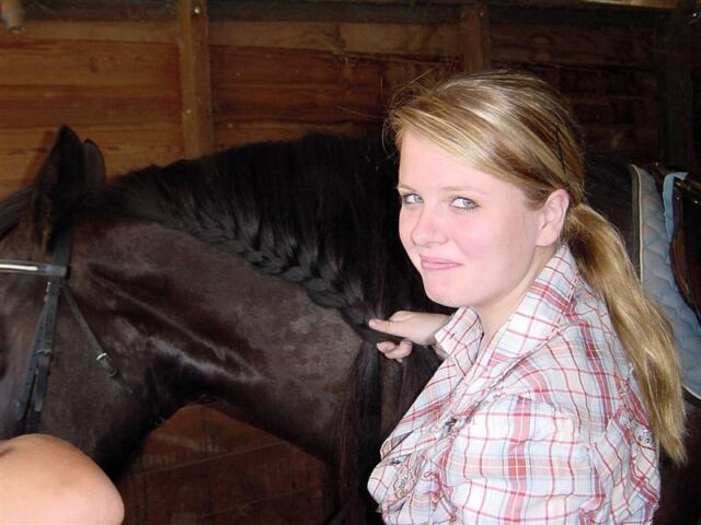 Mel braiding the mane