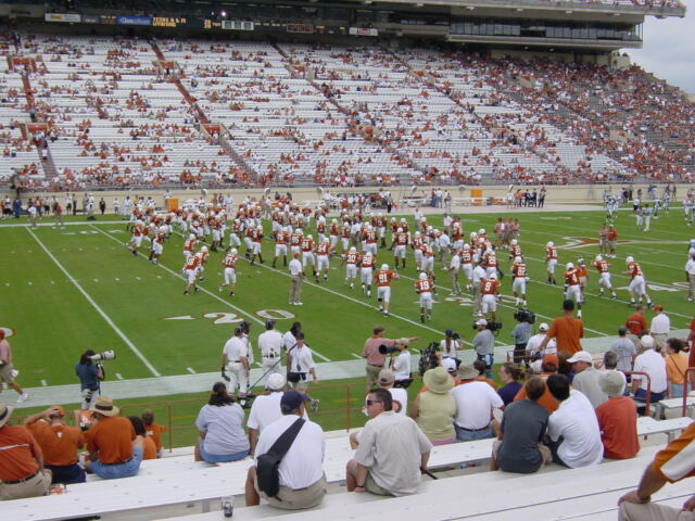 Team runs to center of field for Pittman memorial