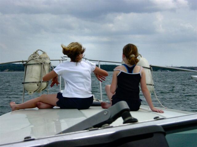 melanie-and-carly-on-the-front-of-the-boat