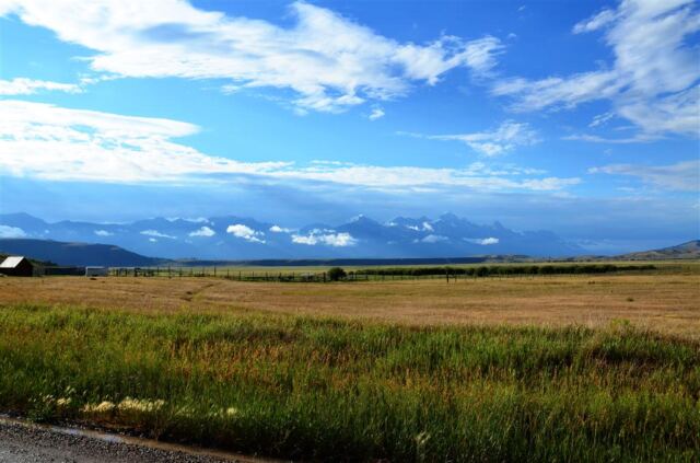 Distant cloud-shrouded Tetons