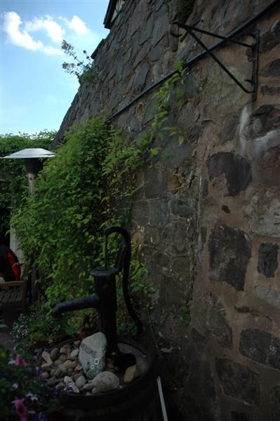 Pump and wall