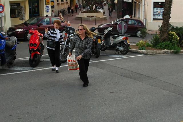 Geri and Kathy cross the street in style