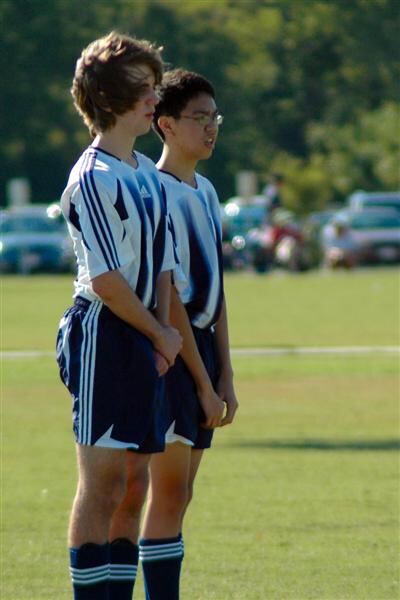 zach-and-bao-set-up-the-wall
