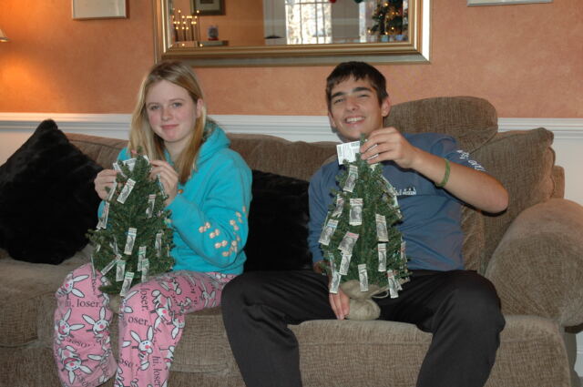 melanie-and-andrew-with-their-money-trees