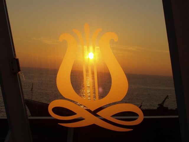 PO - Seven Seas logo and Mediterranean sunset