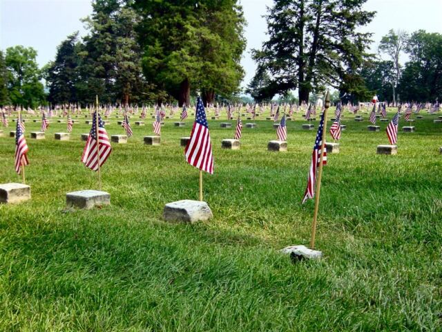 Unknown soldier graves marked with flags