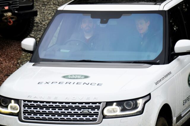 Andrew's ready to climb the stairs in his Range Rover