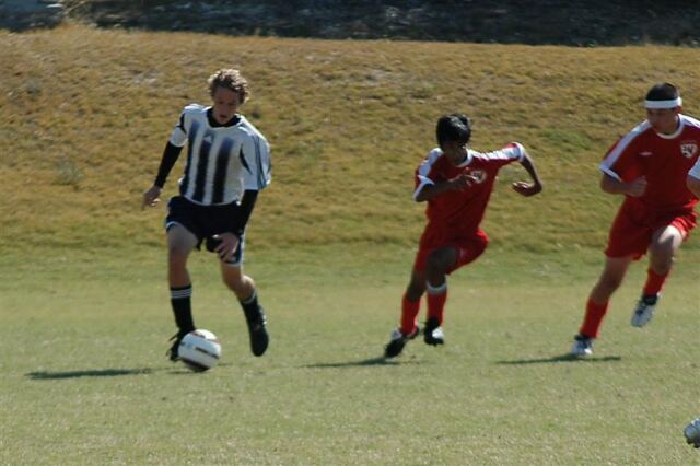 mitch-goes-past-two-defenders