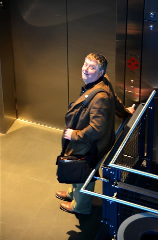 John waits for elevator