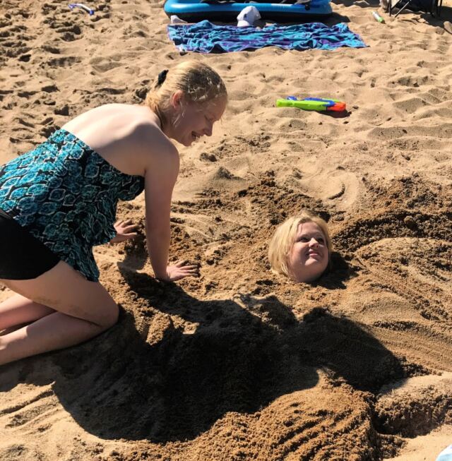 Sand Harbor - Melanie buried in the sand 1