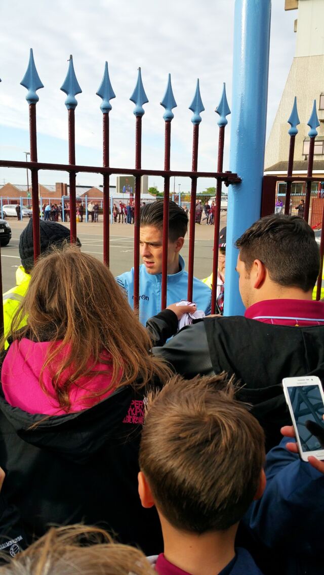 Jack Grealish signing autographs