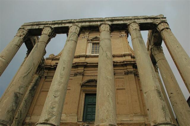 Looking up at columns of Temple of Antoninus and Faustina