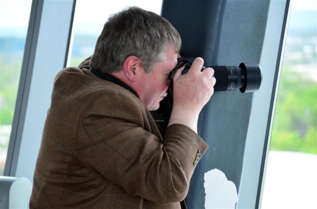John gets a long-range shot from the observation tower