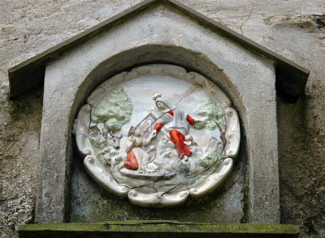 Old plate above door