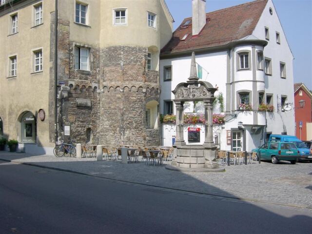 old-well-and-rebuilt-castle-like-building