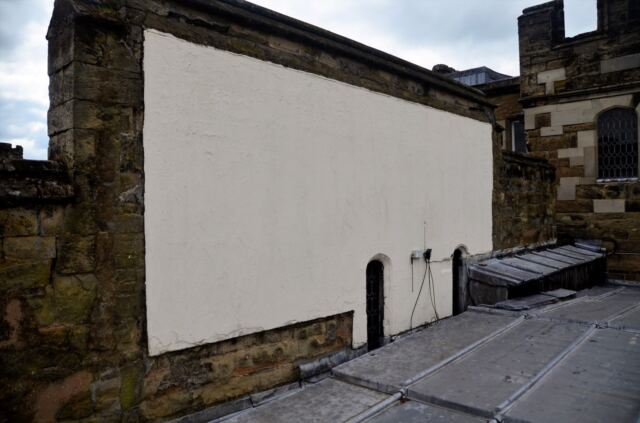 warwick-castle-wall-painted-atop-great-hall-for-early-to-mid-1900s-movie-showings-1
