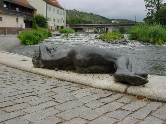 woman-sculpture-and-rapids