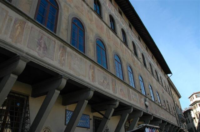 Faded paintings on upper stories