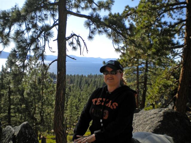 Kathy on Frosty with Lake Tahoe in the distance
