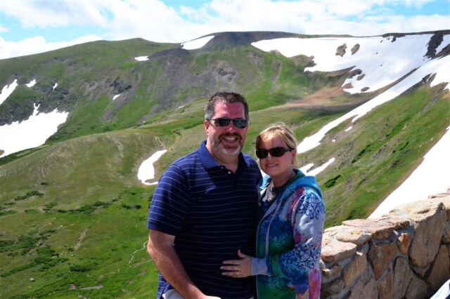 Roger and Kathy at the top of Rocky Mountain National Park