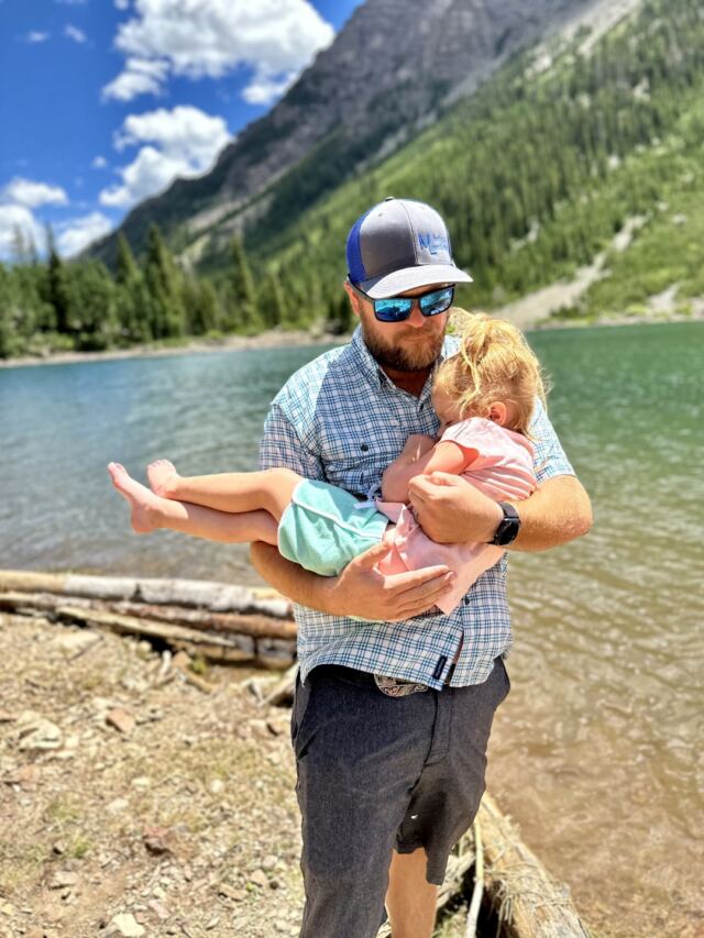 Daddy carrying a tired Shiloh