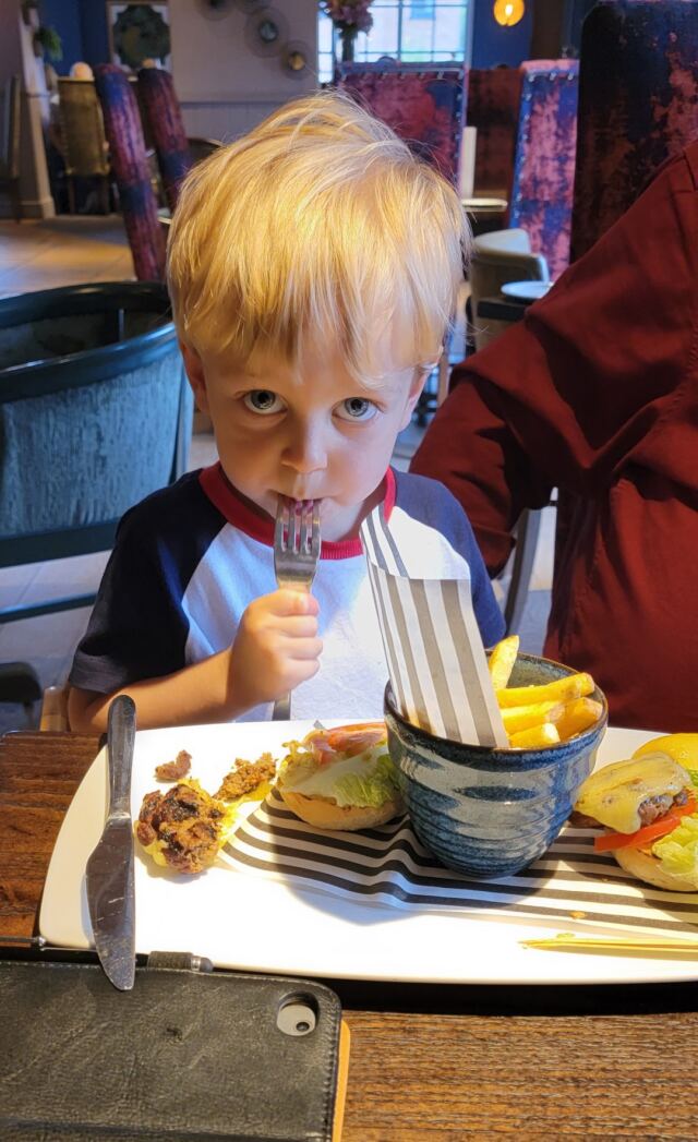 Henry enjoys his dinner