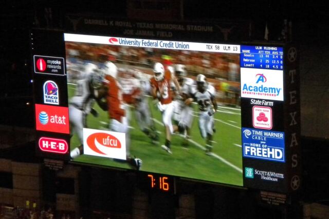 Garrett Gilbert scores his first Longhorn touchdown