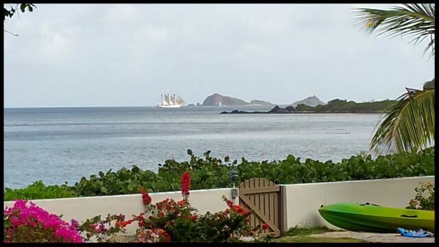Three-masted schooner in Mahoe Bay