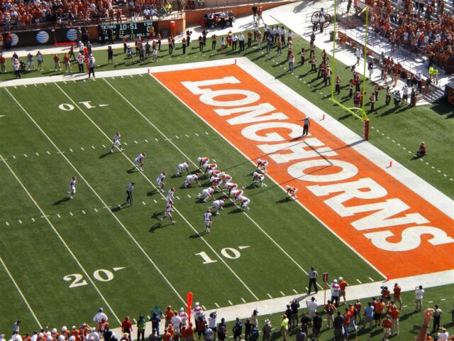 Horns line up in the wishbone formation to honor DKR