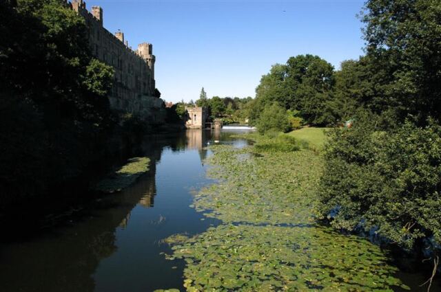 Warwick Castle sits along the River Avon