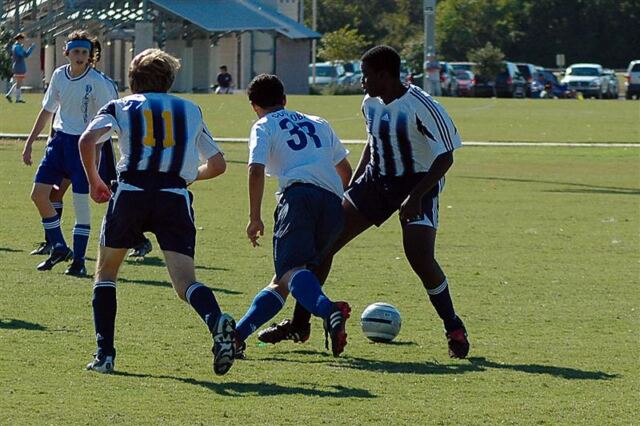 rowland-and-josh-work-the-ball