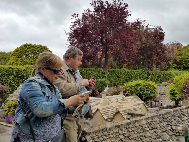 John, Kathy, and phones at Model Village