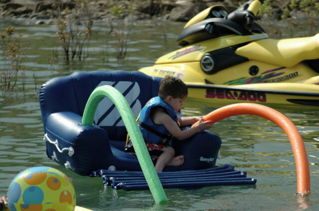ben-plays-with-the-floating-chair