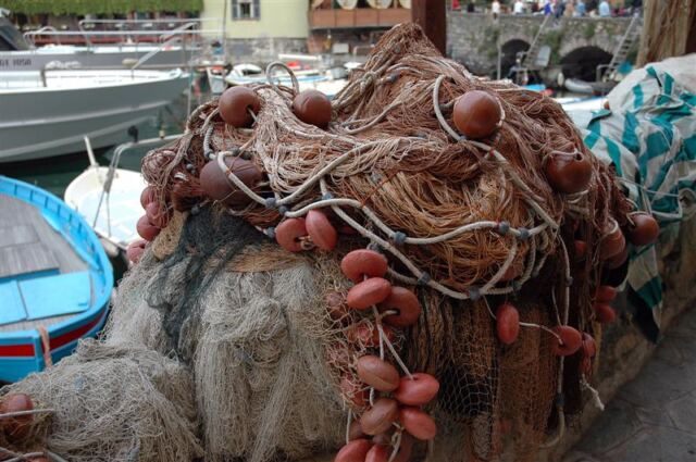 Fishing nets piled and ready to go