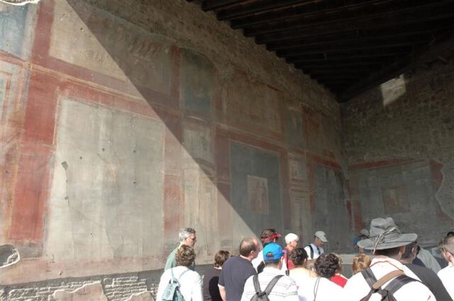 Murals above body casts