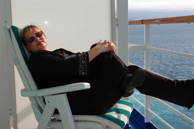 Kathy relaxes on the balcony