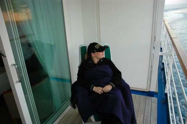 Kathy enjoys the view from our private balcony