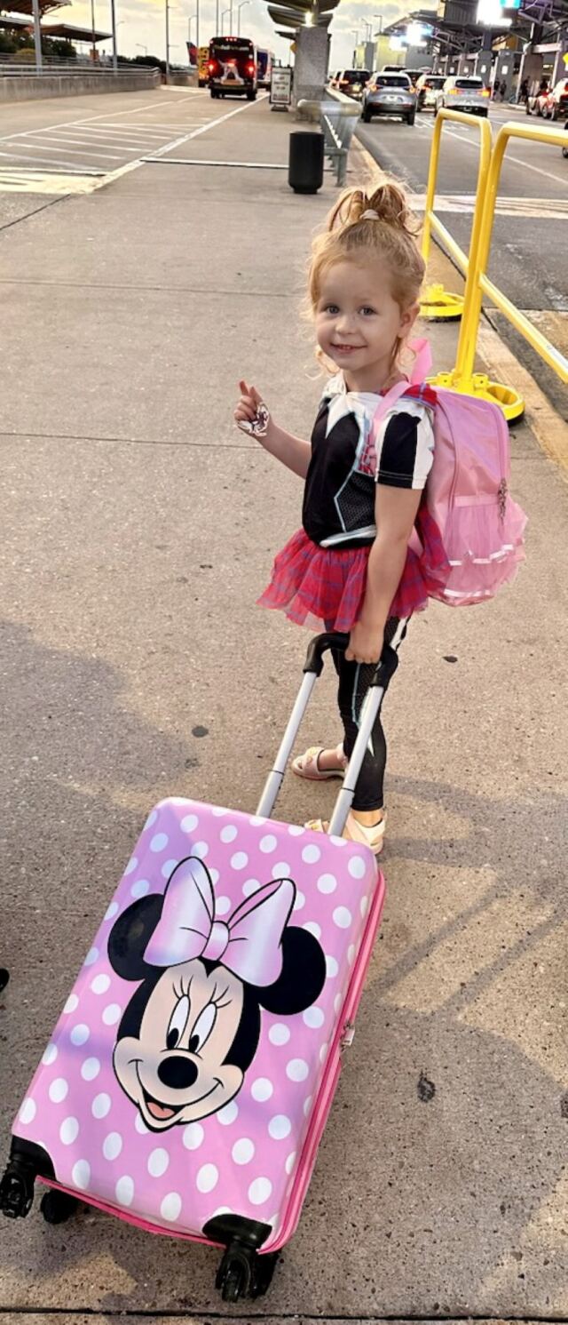 Have Minnie Mouse suitcase - will travel.