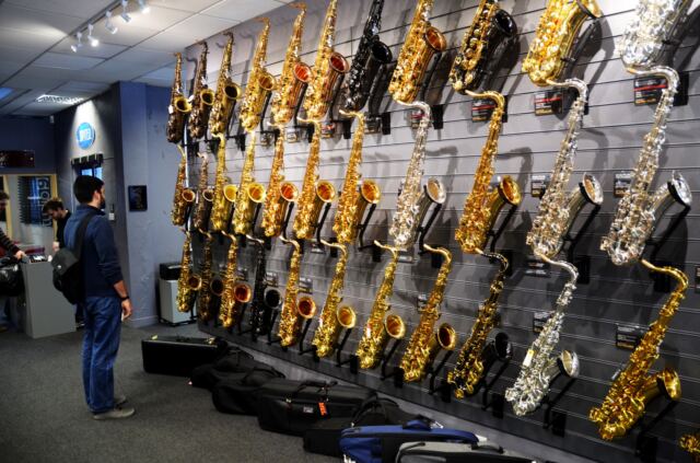 Andrew and the wall of saxophones