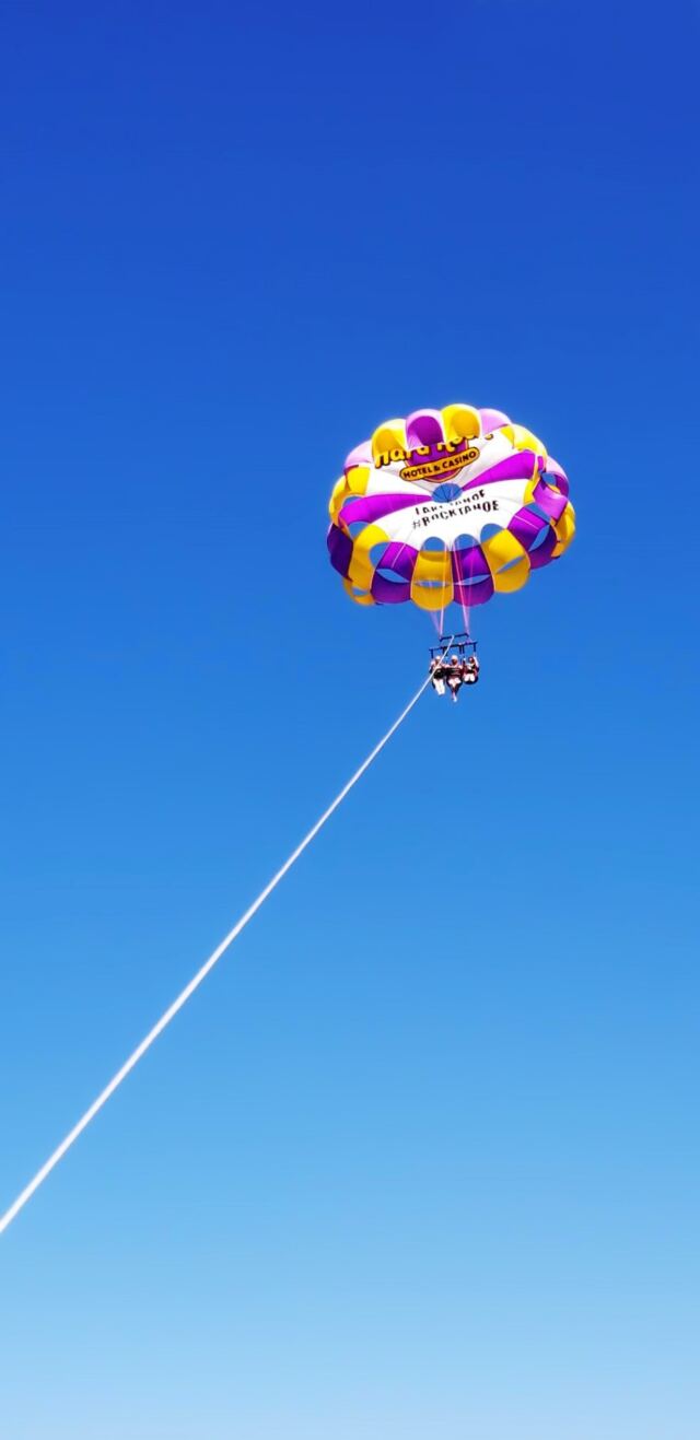 LeAnn, Melanie, Kiersten - parasailing above Lake Tahoe