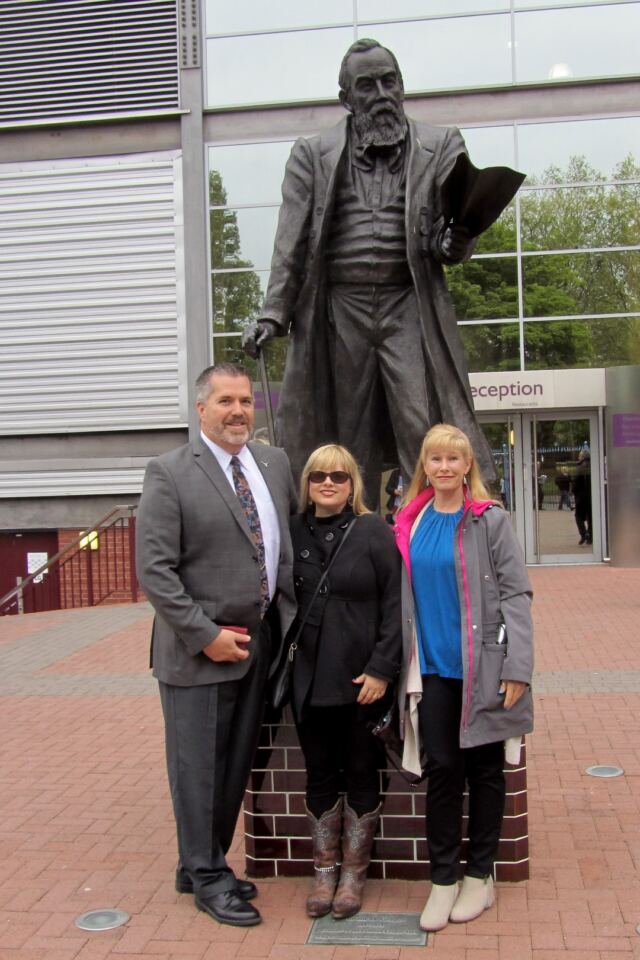 Roger, Kathy, and LeAnn in front of the McGregor statue (1)