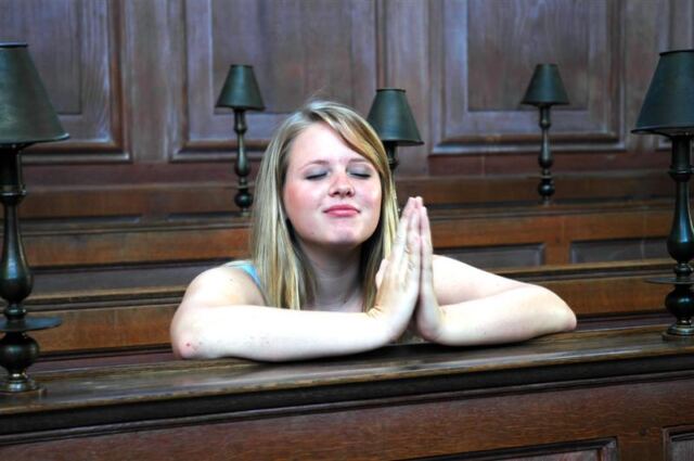 Melanie prays in the Guild Church